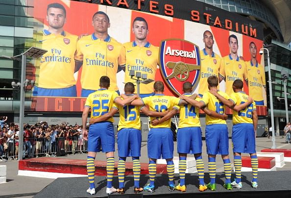 (L-R) Carl Jenkinson, Alex Oxlade-Chamberlain, Jack Wilshere, Theo Walcott, Aaron Ramsey and Kieran Gibbs of Arsenal during the launch of the new away kit for the 2013-14 season at Emirates Stadium on July 09, 2013 in London, England. (Getty Images)